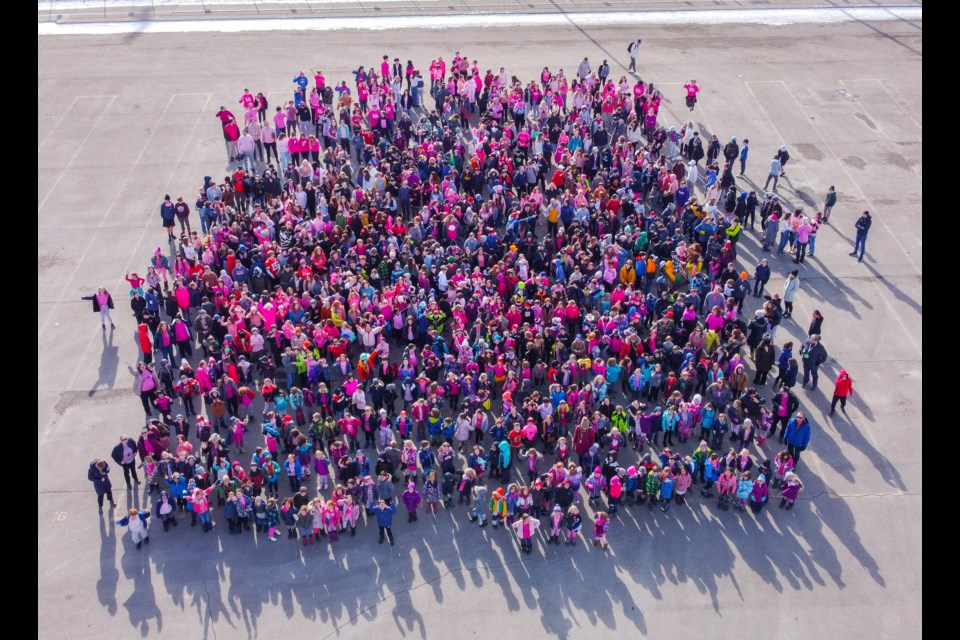 Students from Cochrane's tri-school area donned the colour pink for their annual Pink Shirt Day Photo on Feb. 15, to promote anti-bullying behaviour in schools.