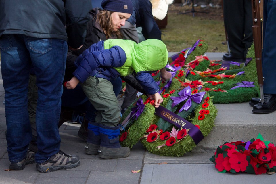 Despite strong winds, Cochranites gathered to honour the lives of those who valiantly protected the rights and freedoms of all Canadians, at the annual Remembrance Day ceremony, at the Cochrane Cenotaph on Nov. 11.