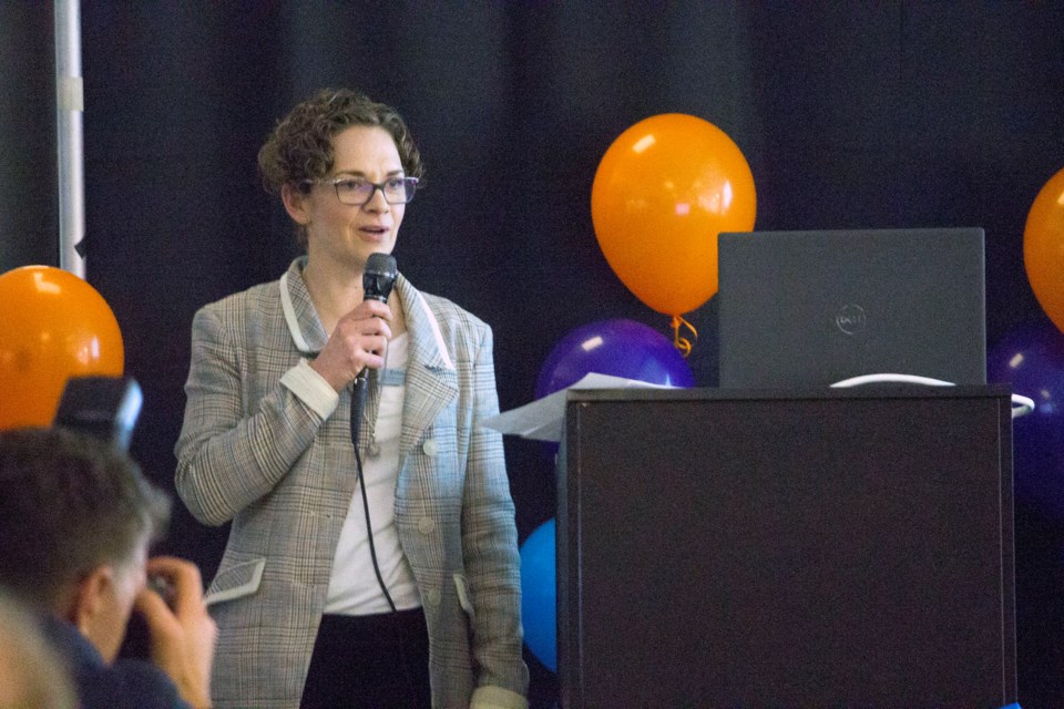 CEO of SLS Centre, Erin Wagner, addresses the crowd Jan. 13 at an event to kick off the rebranding of Cochrane's multi-sport recreation facility.