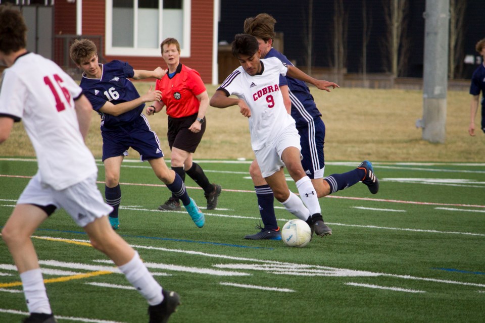 The Cochrane High School Cobras and the Bow Valley High School Bobcats squared off on the Bobcats' home turf last Thursday, in a high-school boys' soccer match that ended in a close 2-1 win for the Cobras.