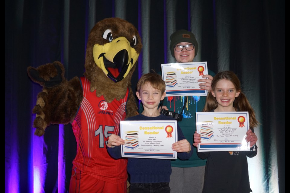 Fireside School's Read-a-Thon Read Every Day draw prize recipients: Callum Wolfe, Cohen Warnke-Guenther, and Briella Shea.
