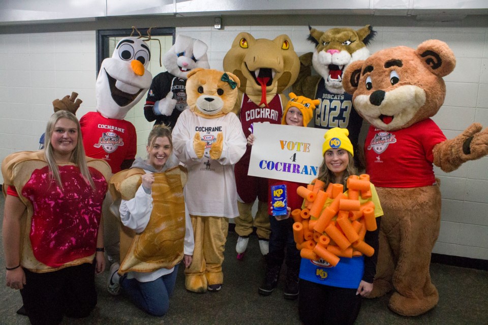 Cochranites gathered at the Old Barn for a rally to show their support in Cochrane's bid for Kraft Hockeyville.