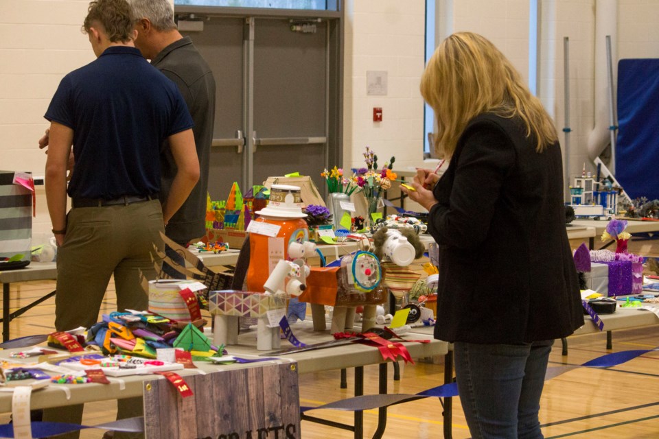 Judges from the community gathered to rate displays by Westbrook's School best and brightest students at the Westbrook School Fair on April 26.