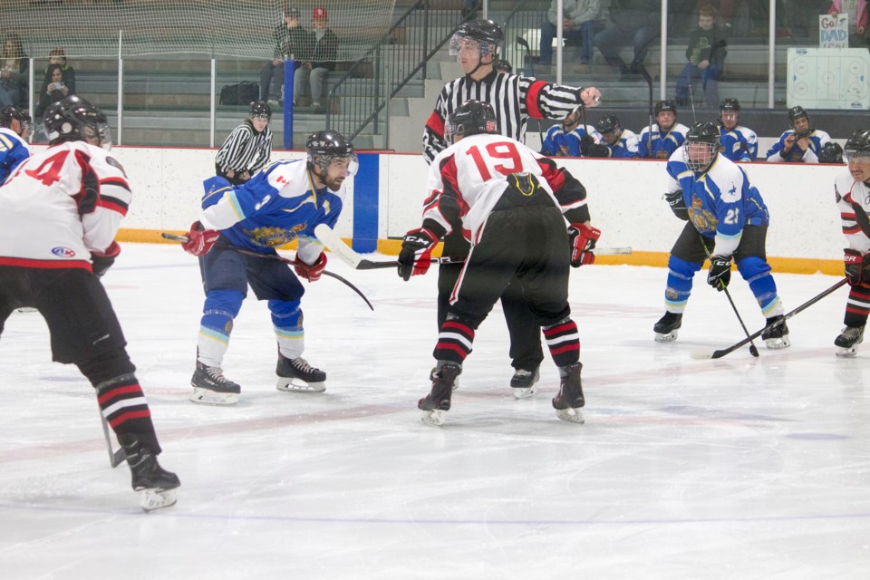 Cochrane Firefighters and RCMP squared off on the ice at the SLS Centre on Family Day for a special and friendly charity hockey match to support the Cochrane Foundation.