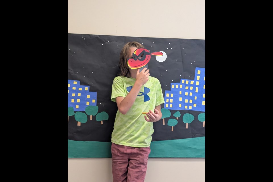The Cochrane Public Library hosted a special “Dog Man" event on July 4.  Themed after the popular children’s book character, Dog Man activity stations were running from 1:00 pm to 2:30 pm with a showing of the Dog Man movie afterward. A special balloon version of the Dog Man Character also came in to surprise the kids. 