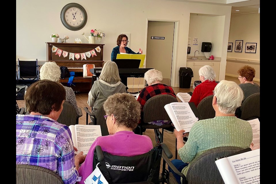 Erica Phare-Bergh, rehearsing with the Good Vibes Memory Choir