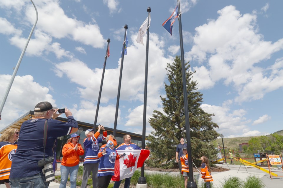 Edmonton Oilers flag raised at the Station to show support for the Stanley Cup contenders