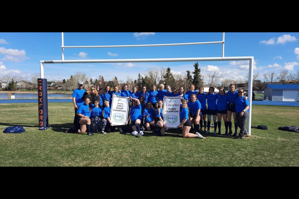 The CobraCats junior and senior girls teams, comprised of athletes from Bow Valley High School and Cochrane High School, each won the divisional championship at Rocky View Schools' Rugby 7s tournament May 9. (Facebook/Sarah Costen)
