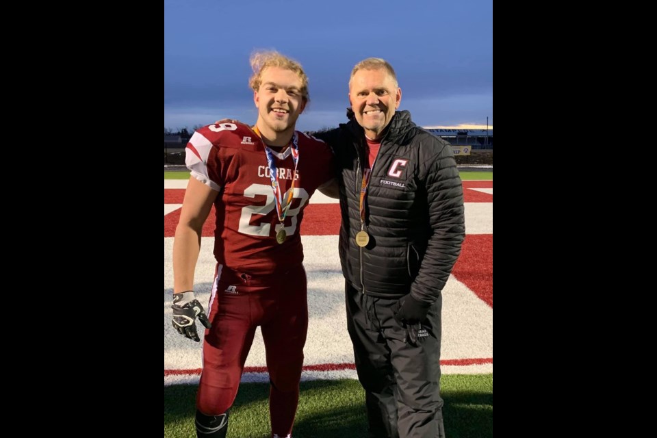 Chandler Ball poses for a photo with head coach Robbie McNabb. Photo submitted.