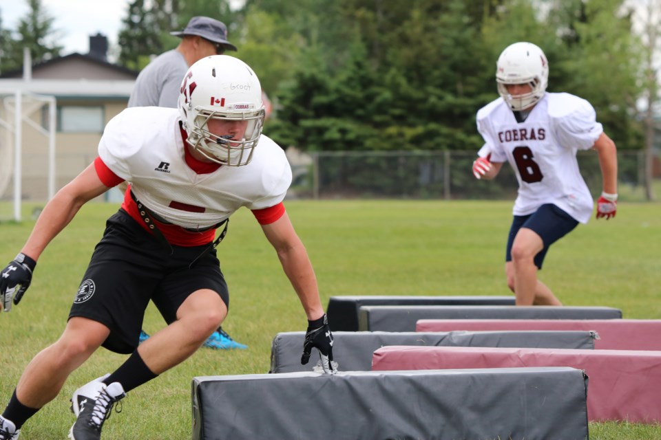 Cobras players work on agility drills at the training camp on Wednesday (June 23). (Tyler Klinkhammer/The Cochrane Eagle)