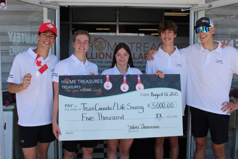 (L to R) Isaac Thibodeau, Jack Dunse, Danica Fisher, Caebri Smith, and Oliver Johnson recived a cheque from Cochrane Home Treasures on August 12. 