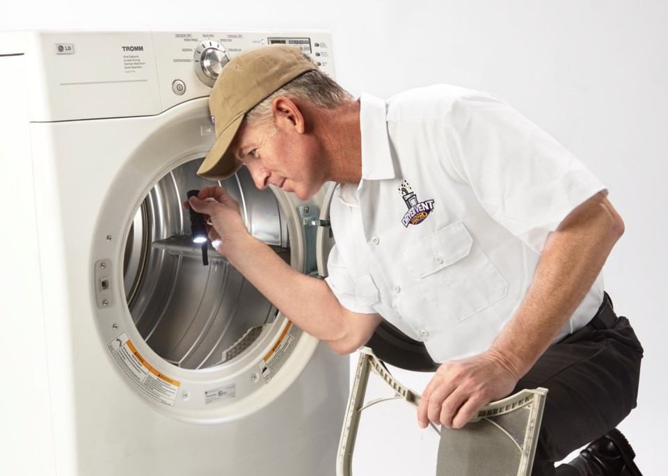 dryer-vent-wizard-tech-examines-dryer