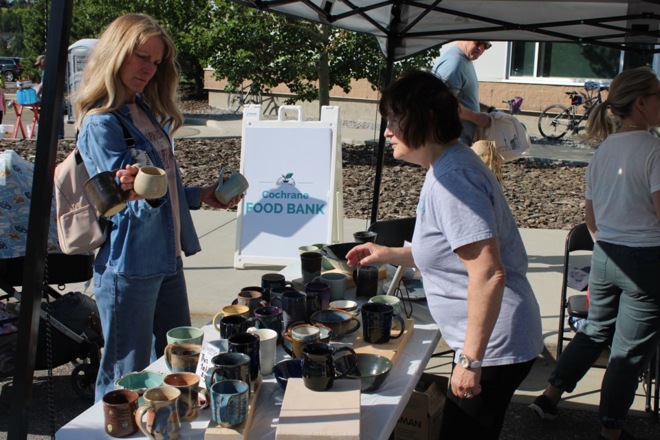 Saffron Collective Studios sold pottery at the Cochrane Farmers Market on August 9. Proceeds from the sale of pottery items went to the Cochrane Food Bank.