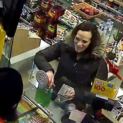 Airdrie RCMP are requesting the public's help in identifying this woman, wanted in connection with the use of stolen debit/credit cards. Photo Submitted