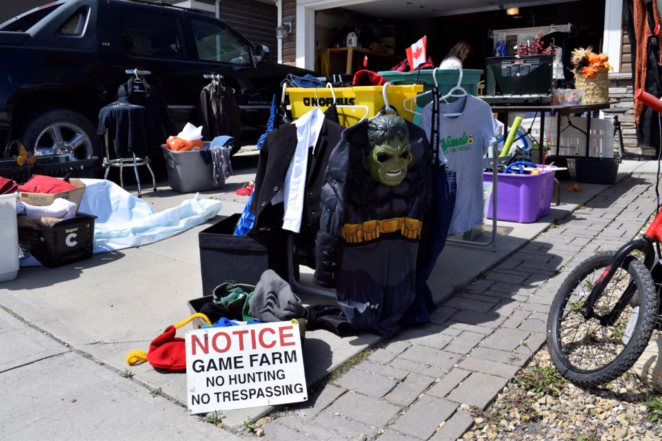 Cochranites hunted for deals at garage sales in Riversong during the Parade of Garage Sales on May 24. 