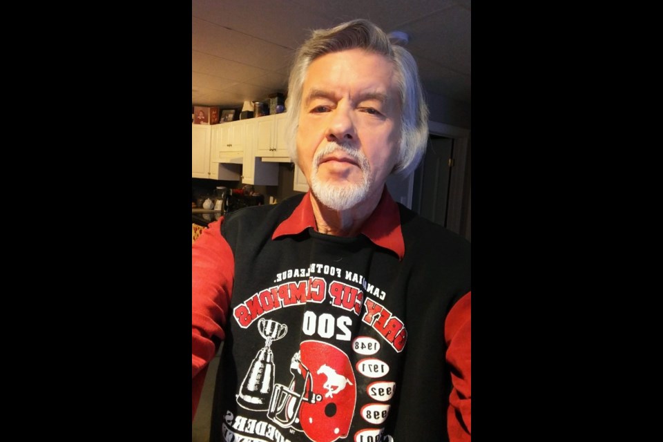 Glenn Olson poses for a photo. 