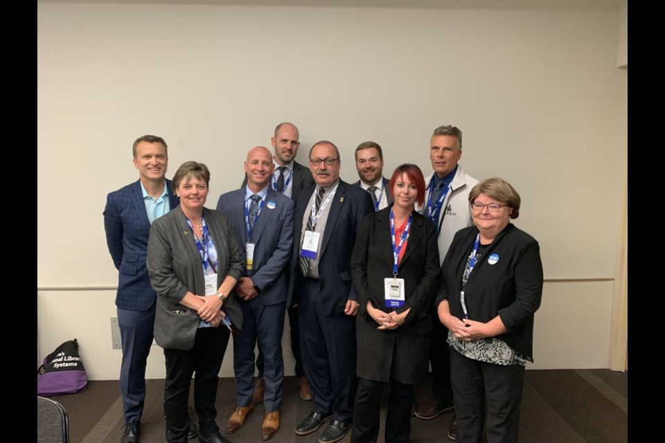 The Cochrane delegation with Transportation Minister Ric McIver and MLA Peter Gurthrie.