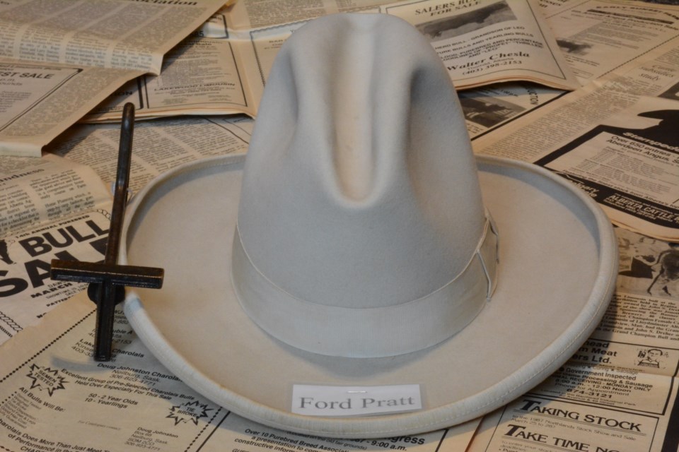 Ford Pratt's hat as well as the Tuberculosis brand that was placed on livestock if they happened to be sick. Photo by Chrissy Da Silva