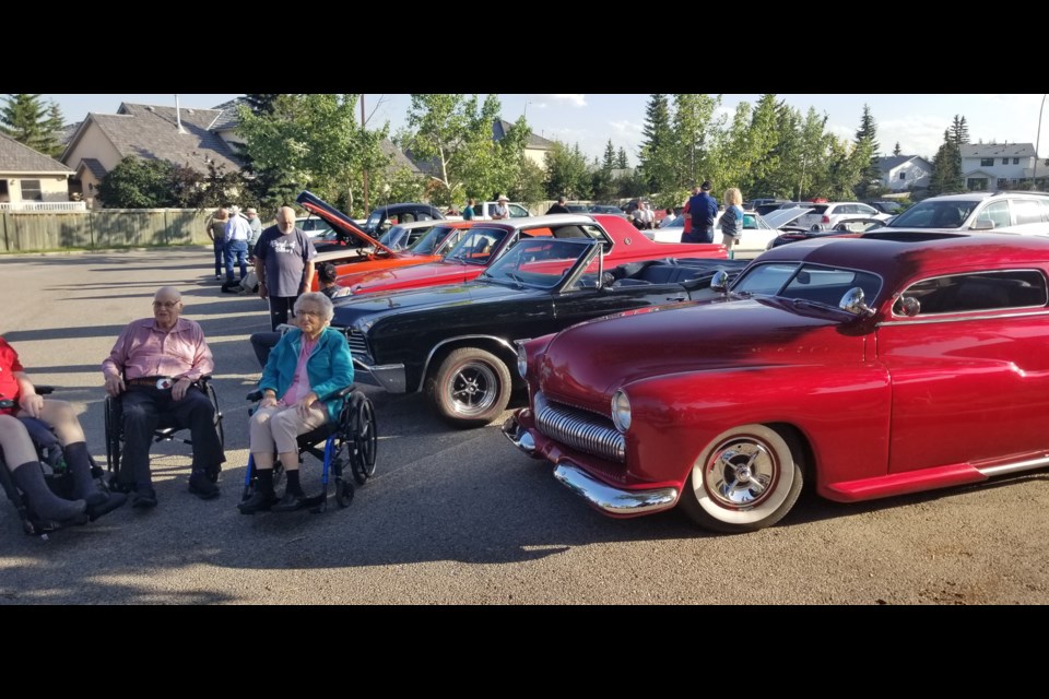 The Cochrane Classic Car Club brought around two dozen cars to the Bethany Cochrane to treat the residents to some sweet rides and help the centre promote its annual 50/50 raffle. 