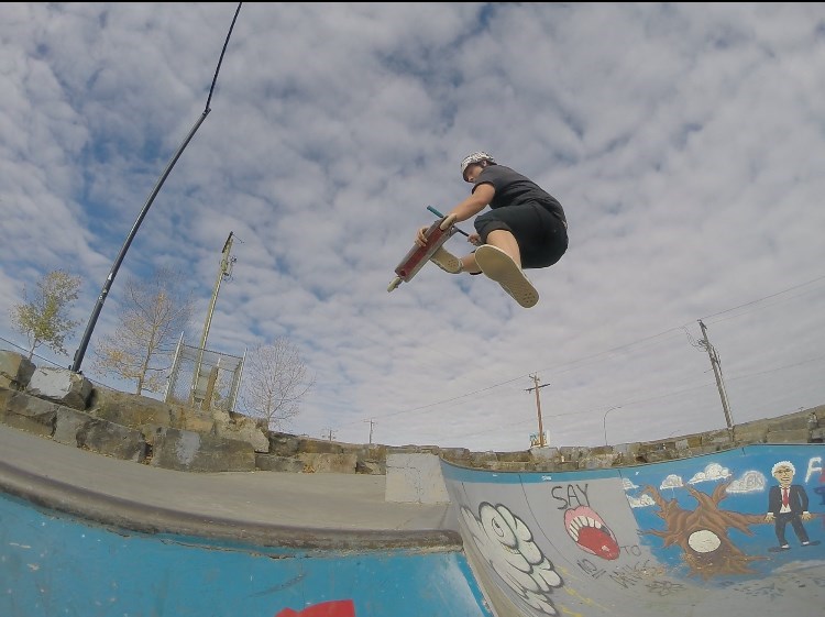 Deven Rasberry, a pro scooter rider in Cochrane, is hoping to see some changes to the town's skatepark.

File Photo