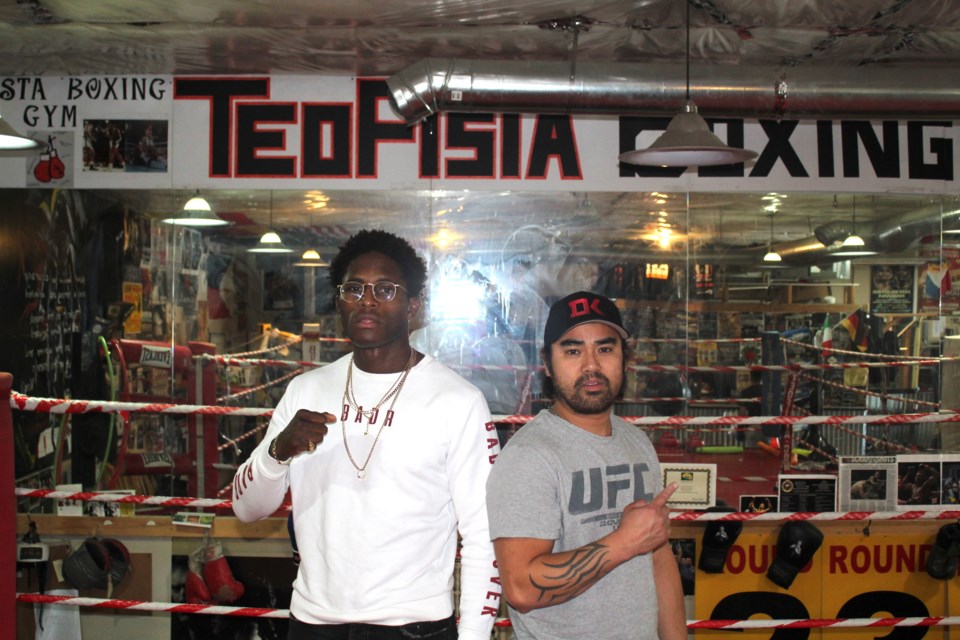 UFC fighter Hakeem Dawodu (left) and his trainer Eric De Guzman (right) are hard at work training for UFC 244, where Dawodu will fight American Julio Arce. Photo by Troy Durrell/Great West Newspapers