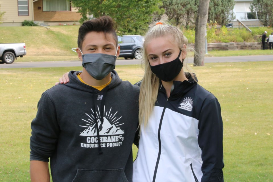 Nicholas Hooper (left) and Holly Moores (right) have both been participating in the Cochrane Endurance Program since its inception two year ago. Nicholas finished the five-kilometre event on Saturday (Sept. 12) with a time of 18:26, while Holly finished in 20:08. (Tyler Klinkhammer/The Cochrane Eagle).