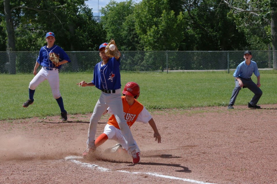 Braeden Bohach-Murray slid into third just inches ahead of the ball in the bottom of the second innning. 