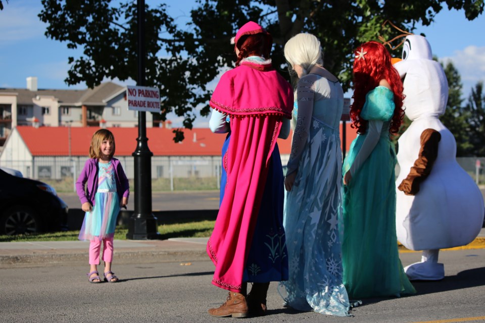  Seven-year-old Stella met a few of her favourite Disney characters on Monday (Sept. 6) morning. (Tyler Klinkhammer/The Cochrane Eagle)