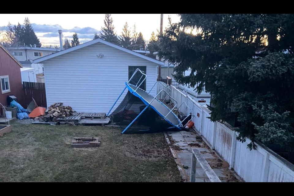 Black Diamond resident Cheyanne Caton's trampoline was blown 30 feet across her yard during a windstorm that started late on Nov. 30.