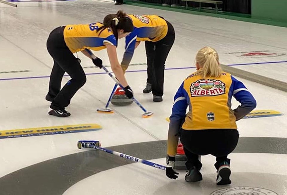 Julianna Mackenzie curling