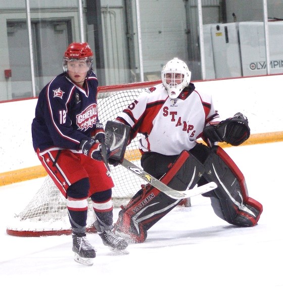 Cochrane Generals rookie forward Steven Tisdale moves into Ponoka goalie Zane Steeves&#8217;s kitchen during Heritage League play Jan. 24 in Cochrane. Tisdale is hoping his