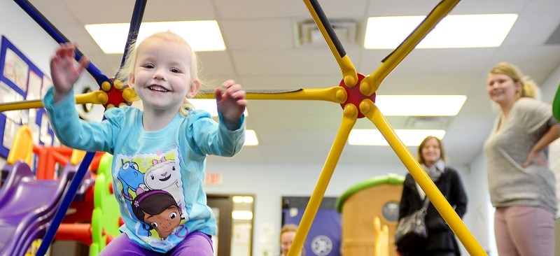 Alyse Lawson, two, plays at the Parent Link Centre Feb. 10. Some in Cochrane have voiced concern for what they feel is a need for another play centre in Cochrane to meet the