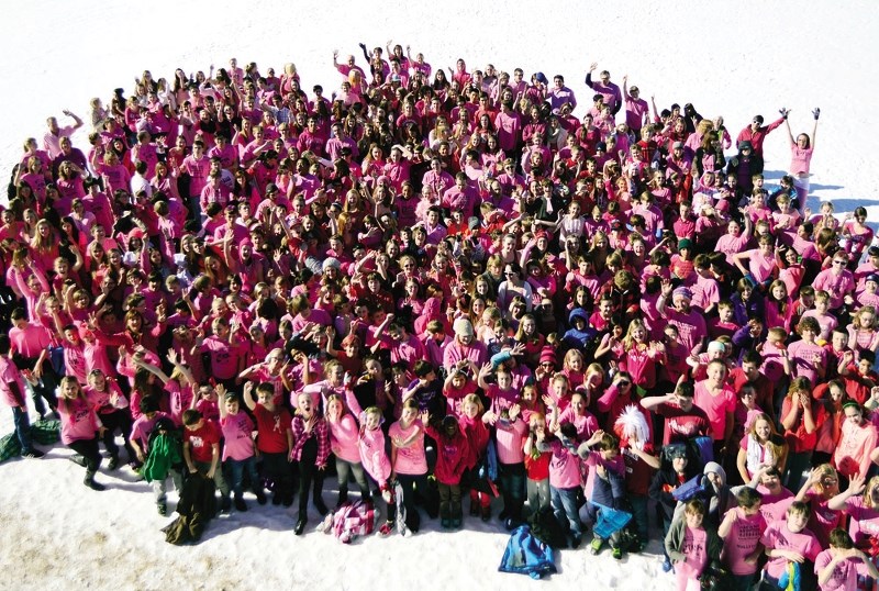 Students from Cochrane High School, Manachaban Middle School and Elizabeth Barrett Elementary School adorn pink for Pink Shirt Day last year to stand up against bullying.