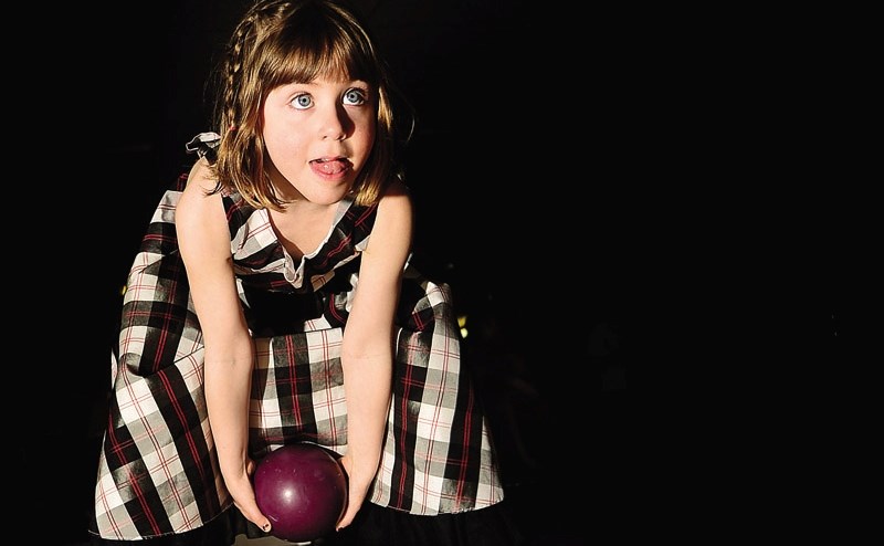 Kalyna Mackenzie gets ready to throw her bowling ball down the lane during the first Big Brothers Big Sisters Bowl For Kids Sake charity event at Cochrane Lanes. This