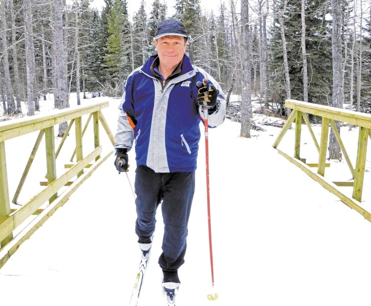 Eric Lloyd, Greater Bragg Creek Trails Association special projects coordinator, enjoys spending time on West Bragg Creek trails Feb. 20.