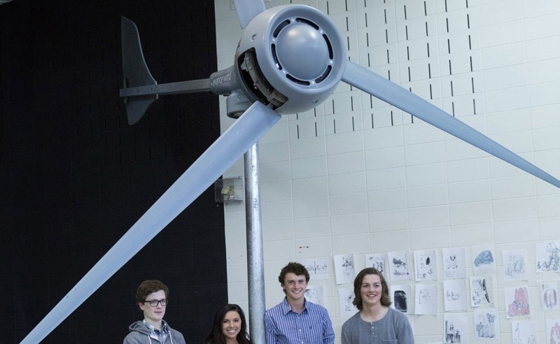 2013 Cochrane High School students Atom Sibbald, Emily Schumacher, Atom Dodd and Lawson Parker stand by the school&#8217;s proposed wind turbine.