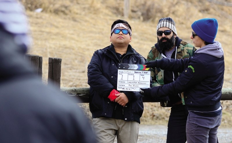 Actor Andrew Phung and Cowtown co-creator/producer Ramin Eshraghi-Yazdi shoot scenes for the sketch comedy in Cochrane April 4.