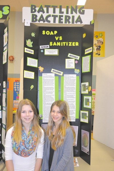 From left: Westbrook students Kianah Howk and Kya Shelstad were two of the gold medalists for their &#8216;battling bacteria&#8217; project.