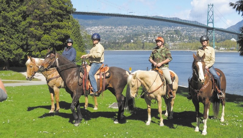 From left: Iska Scholl, Paul Nichols, Simon Crimp and Terry Nichols in Vancouver&#8217;s Stanley Park on day two of The Ride Across Canada April 14.