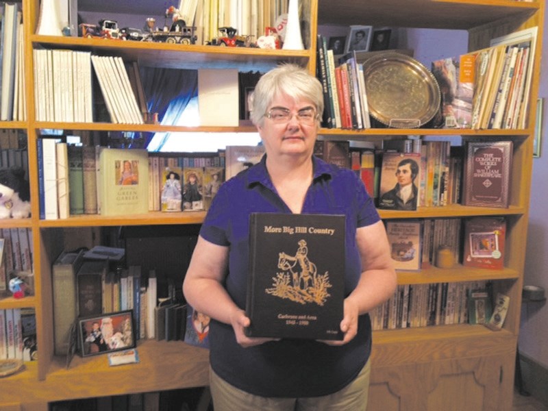 Bernice Klotz and her copy of More Big Hill Country.