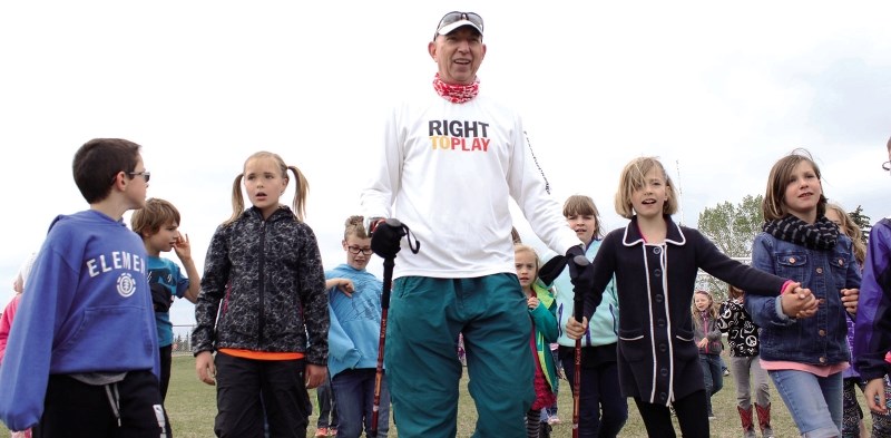 Martin Parnell walking with Cochrane students May 29.