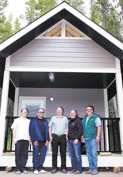 Banff-Cochrane MLA Cameron Westhead, architect Scott McKay, facility manager Ross Watson, Alberta Parks special facilities manager Michael Roycroft, and board president Wayne 