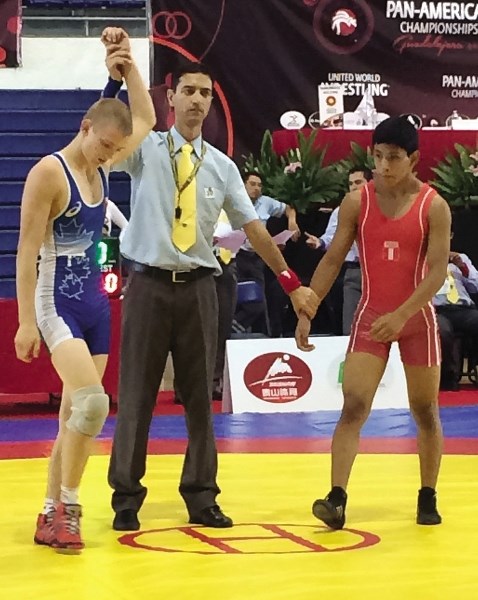 Wrestling for Team Canada at Guadalajara, Mexico, Cochrane Cowboys and St. Timothy School Thunder wrestler Connor McNeice (left) won a silver medal July 5 at the Pan-American 