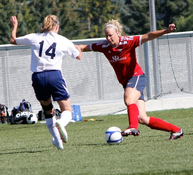 Cochrane Rangers forward Andrea Stevens works the ball up field against Jags Alumni in Calgary Women&#8217;s Soccer Association Over-30 Classics play July 18 in Calgary.