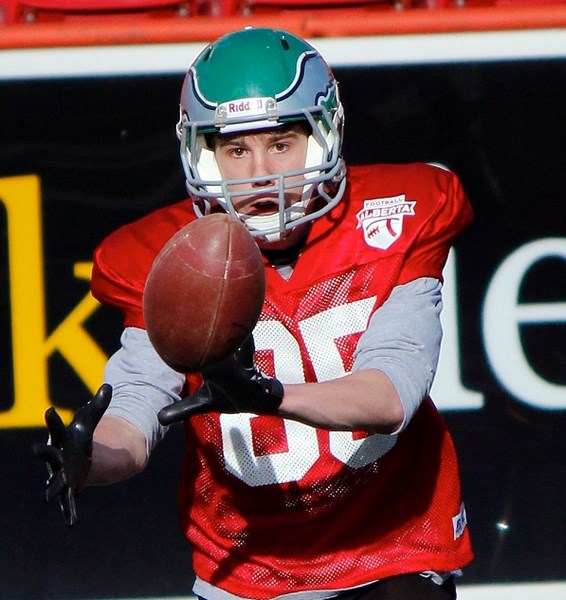 Springbank Phoenix grad Jesse Schonacher is auditioning at quarterback for the Calgary Jr. Colts at training camp.