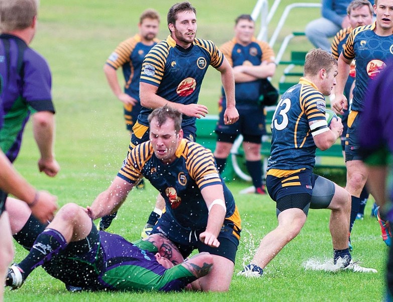 Bow Valley Grizzlies lock (second row) Martin Carew makes a tackle in Calgary Rugby Union Second Division men&#8217;s play against Red Deer Titans on Aug. 15. Carew and the