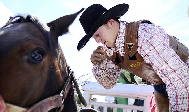 Logan Young of Caroline Alberta in novice horse riding Summer Wages at last year&#8217;s Labour Day Rodeo.