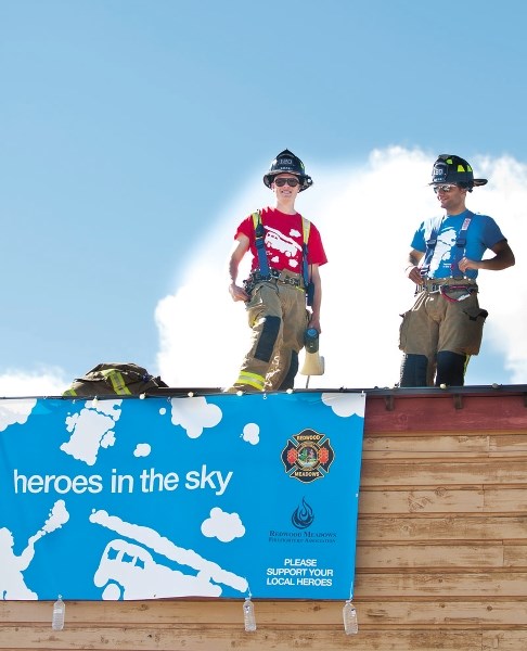 Firefighters James Fischer and Ali Hamzeh.