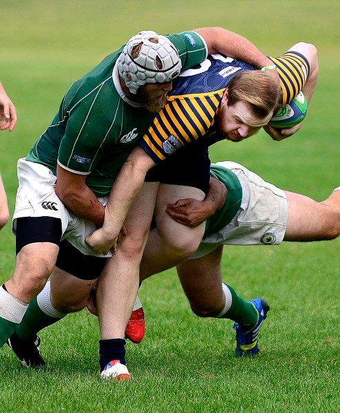 Bow Valley Grizzlies&#8217; Ben Mayo bulls ahead for yardage in Calgary Rugby Union Second Division men&#8217;s play vs. Calgary Canadian Irish Athletic Club on Aug. 29 at