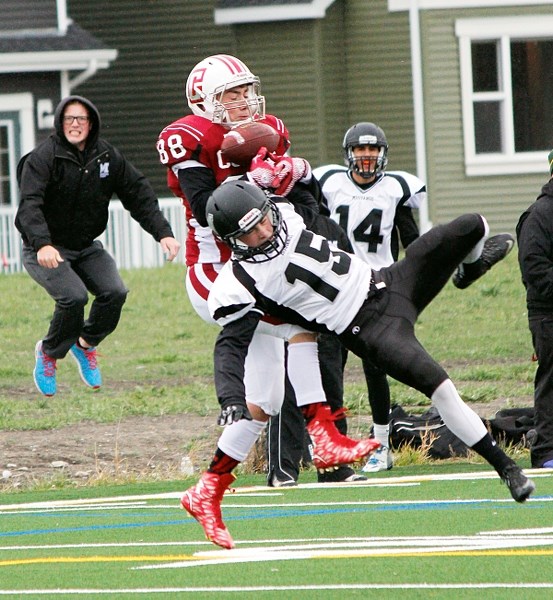 Cochrane Cobras receiver Evan Perrault (88) goes up for a pass in Rocky View Sports Association high school football play vs. Airdrie&#8217;s George McDougall Mustangs on